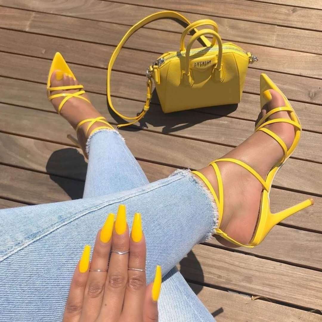 Stiletto heels with pointed cross